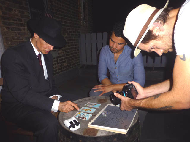 Cameraman recording tarot reading.